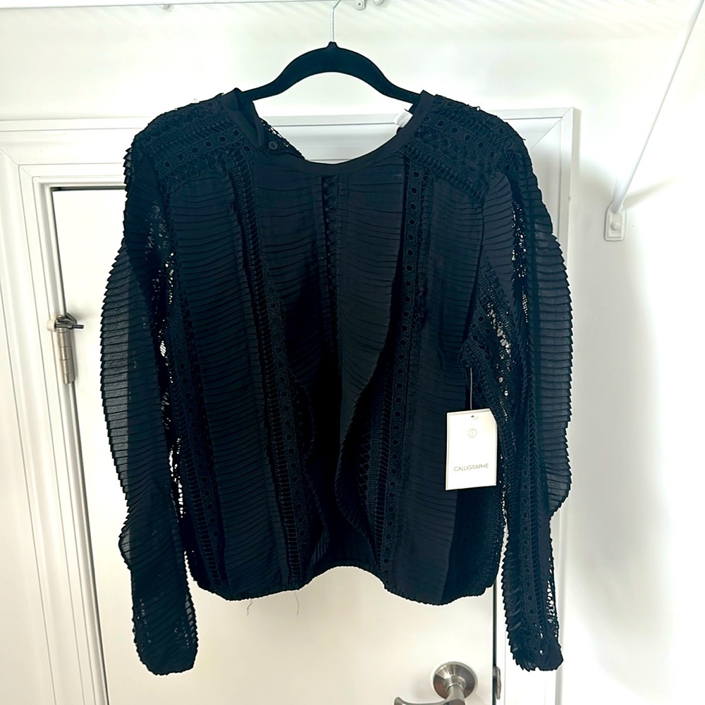 Chick black blouse! Perfect for a cute winter date. Size M